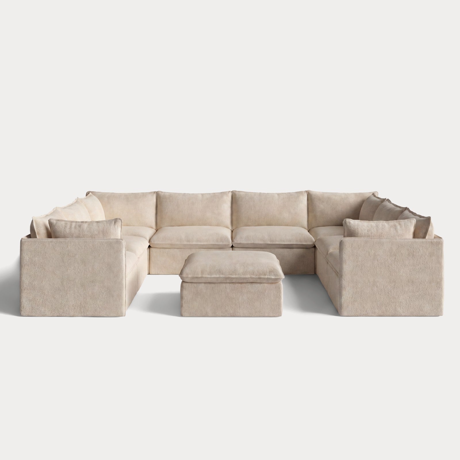 ch_front-view_8-seater-u-sectional-ottoman-cashew